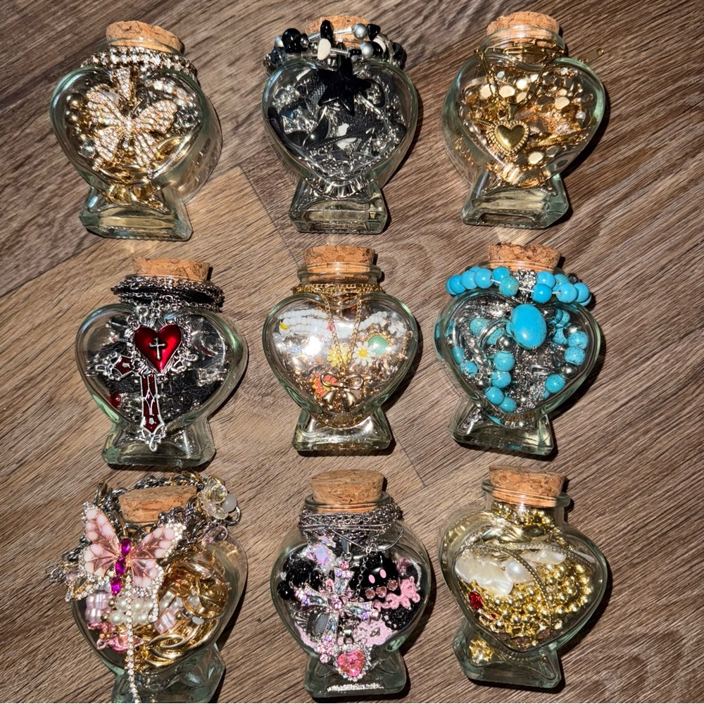 Heart-Shaped Glass Jars with Assorted Jewelry